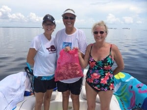 3 people scalloping